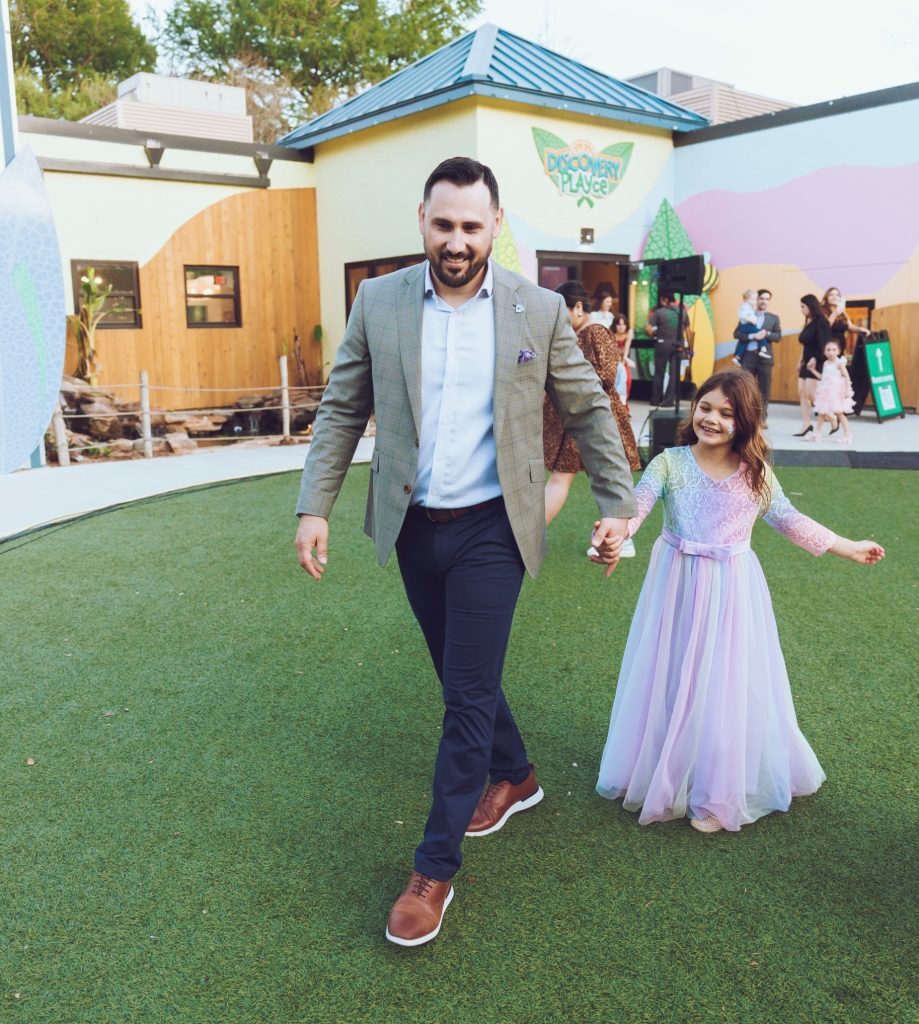 Robby Brown of DOCUmation spending time with his daughter at a San Antonio Zoo event